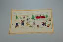 Image of Embroidered place mat with MacMillan-Moravian school and Inuit figures